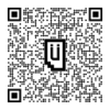 A QR code with a smiley face inside a text box.